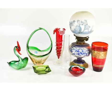 A small collection of coloured art glass including bowls and vases, with a blue and white transfer oil lamp.Condition Report: