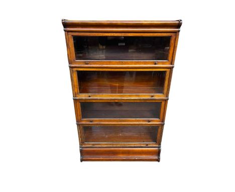 GLOBE WERNICKE CO LTD; a four section stacking bookcase, height 138cm, width 86cm, depth 27cm.