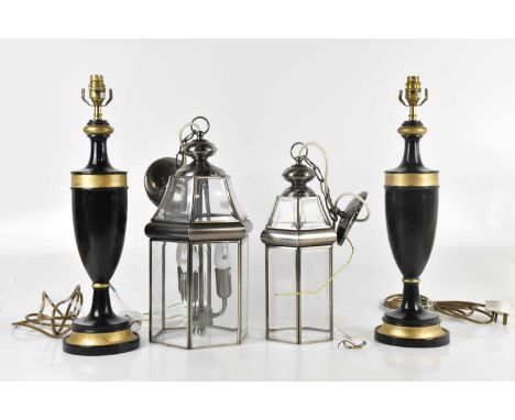 A pair of modern black painted table lamps, 52cm, together with two lamplets.Condition Report: The item or items in this lot 
