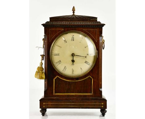 A Regency inlaid rosewood bracket clock, with brass finial and loop handles, the painted dial set with Roman numerals, with s