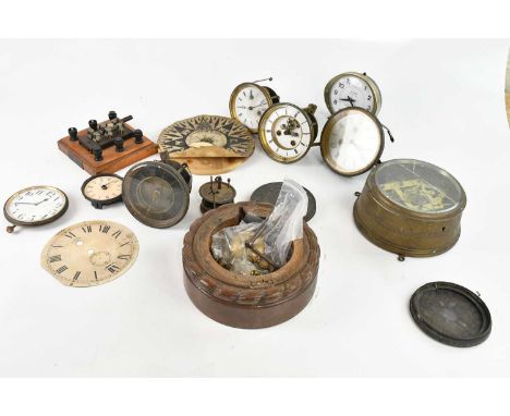 An assortment of clock parts, movements, faces, barometer case, etc (qty).
