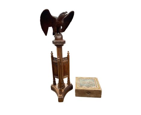 A carved oak ecclesiastical lectern and step, height 171cm.Provenance: Purchased from an Ecclesiastical supplier in Westminst