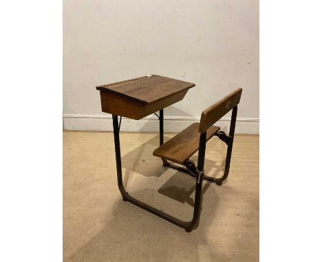 A vintage school desk with metal frame, height 83cm, length 73cm.