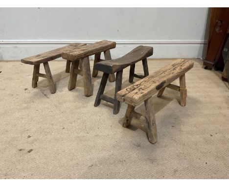 Four vintage rustic stools, length of largest 65cm (4).