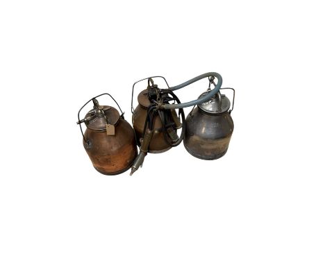 Three vintage milk churns including a copper example with fittings, height 50cm (3).