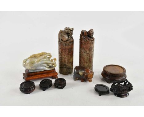 A Chinese jade style hardstone carving of an octopus, lizard, and insect around a rock, length 10cm, two carved soapstone sea