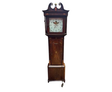 An early 19th century mahogany eight day longcase clock, with white painted dial set with Roman numerals moon phase and subsi