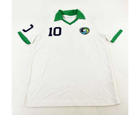 PELÉ; a New York Cosmos retro style football shirt, signed verso, size XL.Condition Report: Light creasing and fading, no cer