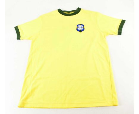 PELÉ; a signed Brazil 1970 retro style football shirt, signed verso.Condition Report: Light creasing and fading, no certifica