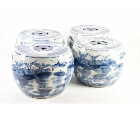 Four Chinese blue and white porcelain garden seats, each decorated with figures in landscape, height 24cm, diameter 31cm (4).