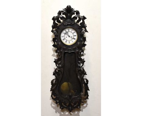A late 19th century Black Forest Vienna wall clock of shaped form, the enamel dial set with Roman numerals, height 107cm.Cond