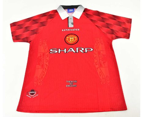ERIC CANTONA; a Manchester United 1996/98 retro style football shirt , signed verso, size L.Condition Report: Light creasing 