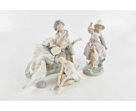 NAO; a large figure group representing a geisha playing a guitar, height 26cm, length 29cm, a Lladrό figure of a girl playing