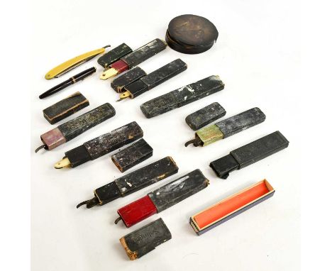 A collection of vintage cut throat razors, a Victorian papier-mâché circular casket and cover decorated with a battle scene, 