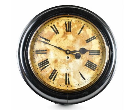 An early 20th century large English station clock, with white enamel dial set with Roman numerals, diameter 57cm.Condition Re