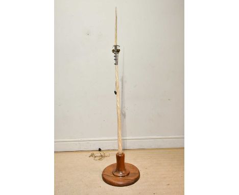 X A narwhal (monodon monoceros) tusk lamp, on oak base, height 213cm.CITES number; 24GBA10GRZLQ1  Condition Report: The oak b