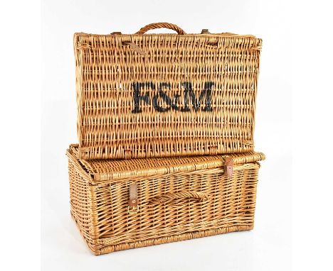 FORTNUM &amp; MASON; two vintage wicker hampers, with retailer's logo 'F&amp;M' to top, with leather strap closures to front,