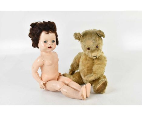 A vintage teddy bear and a vintage talking doll (2).