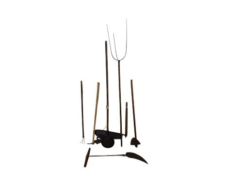 Six vintage garden/farming tools including a hand seed sewer, etc.