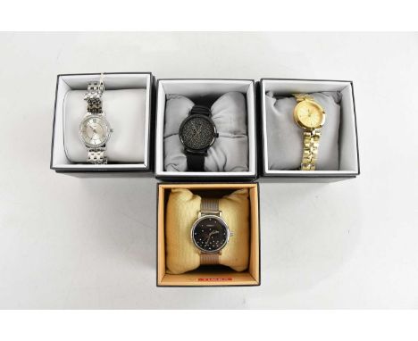 TIMEX; four gentleman’s wristwatches, comprising a black example with ‘glitter’ dial, a gilt metal example with dots for 3, 6