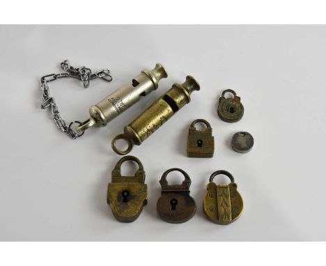 Six antique padlocks including an example indistinctly marked 'Bapsiaaebb', possibly Russian, and two vintage policeman's whi