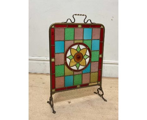 A Victorian brass framed fire screen, with lead glazed centre and rope twist effect handle, height 72cm.
