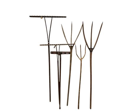 Three Victorian style vintage hay forks and three vintage treen rakes, largest approx height 193cm (6).