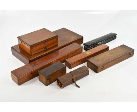 An extensive collection of scientific instruments, including various treen box sets of rulers stamped 'A.G. Thornton', implem