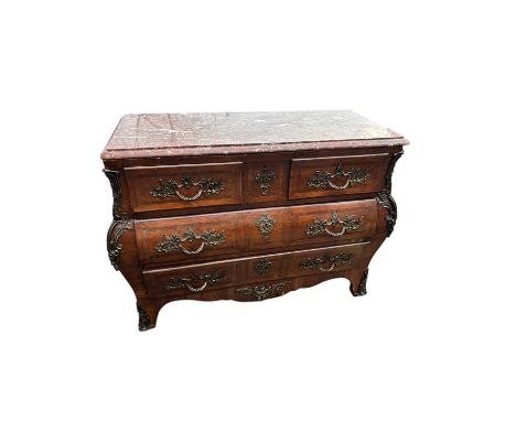 A Louis XV style bombé commode chest of drawers with two short over two long drawers, marquetry veneered panel under red marb