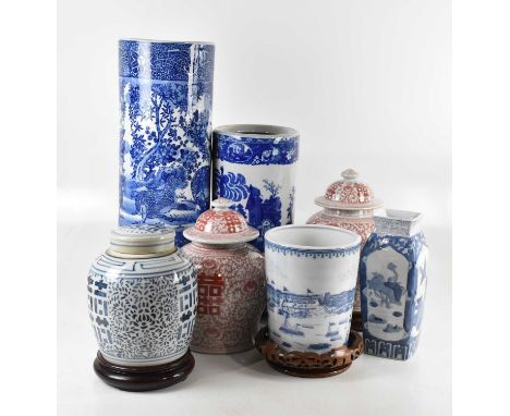 A pair of modern Chinese red and white ginger jars and fixed covers, height 30cm, with a provincial style blue and white ging
