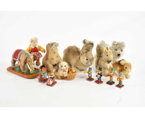 STEIFF; a rabbit soft toy, with wood wool stuffing and button to ear, length 16cm, with four other animal soft toys, a small 