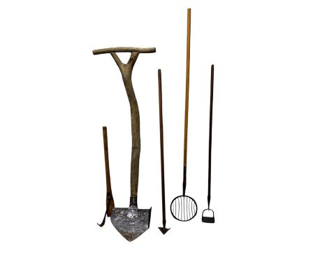 A collection of vintage farm/garden tools including a large unusual spade with side brackets, height 154cm, apple gathering c