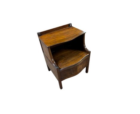 A Victorian mahogany serpentine front commode, on block legs, height 73cm.