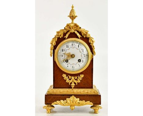 A late 19th century French ormolu mounted kingwood bracket clock with pineapple finial, the enamel dial set with Arabic numer