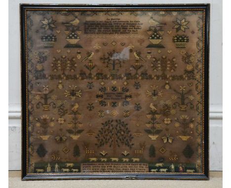 A 19th century tapestry, decorated with prayer, birds and flowers, 55 x 59cm, framed and glazed.