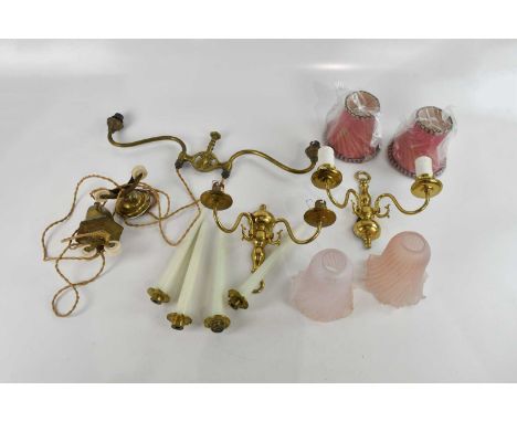 A late Victorian brass rise and fall lamp and a pair of reproduction brass twin branch wall lights (3).Condition Report: The 