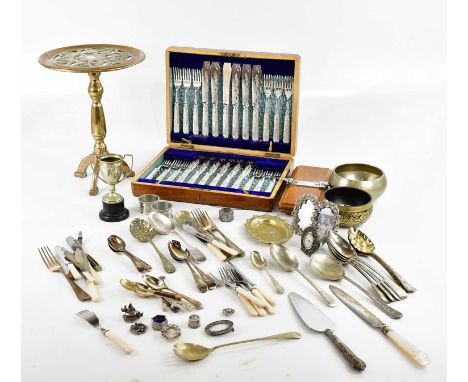A cased canteen of silver plated fish knives and forks, assorted silver plated and base metal flatware, brass miniature table