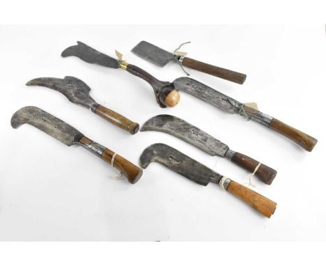 A collection of vintage billhooks including William Swift, Elwell examples, also a butcher's knife (7).