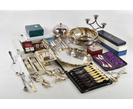 A collection of silver plated items including flatware, bowls and coasters, also a hallmarked silver pierced bonbon dish.