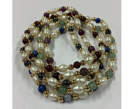 A group of five pearl and gold mounted bracelets. Approx. 28 grams. Est. £20 - £30.