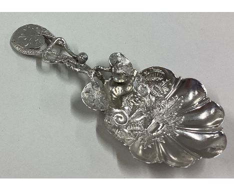 An attractive cast Victorian silver caddy spoon. Birmingham. Approx. 14 grams. Est. £60 - £80.