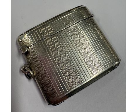 CHESTER: An engine turned silver vesta case. 1911. By Robert Pringle. Approx. 32 grams. Est. £30 - £40.