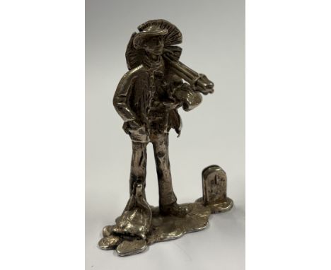 A large silver table toy of a chimney sweep. Approx. 58 grams. Est. £50 - £80.