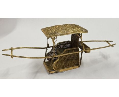 WANG HING: A Chinese export silver gilt table toy with filigree decoration. Marked to base. Approx. 19 grams. Est. £40 - £60.