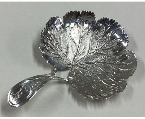 A stylish silver caddy spoon of leaf form. Birmingham. Approx. 11 grams. Est. £50 - £80.