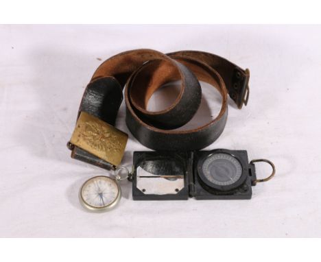 British WWI magnetic marching mark I compass by T G and Co Ltd number B41137, a pocket compass and a Spanish army brass belt 