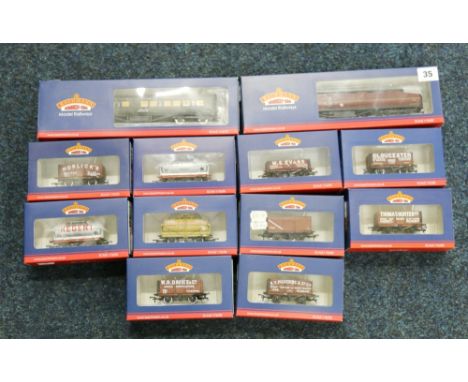 12 Bachmann Branch-Line OO gauge model railways rolling stock items including 34-253, 34-654B, 37-351B Steel Mineral Wagon MW