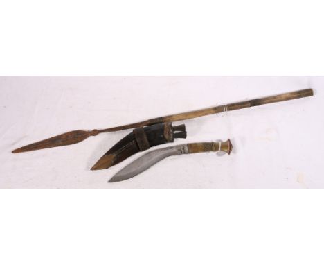 Horn handled kukri dagger with leather scabbard and a carved wood and metal throwing spear, 81cm long 