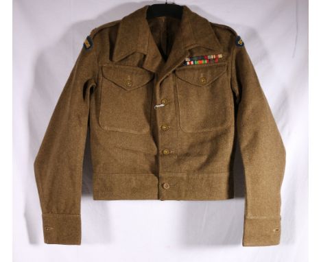 British army uniform dress green khaki tunic with cloth shoulder titles for Scots Guards and medal ribbons for MC, GSM, WWII 