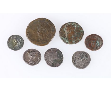 Six Roman coins including Claudius AD41-54 copper quadrans S1863, Commodus AD177-192 brass sestertius S5764 RIC619, Marcus Au